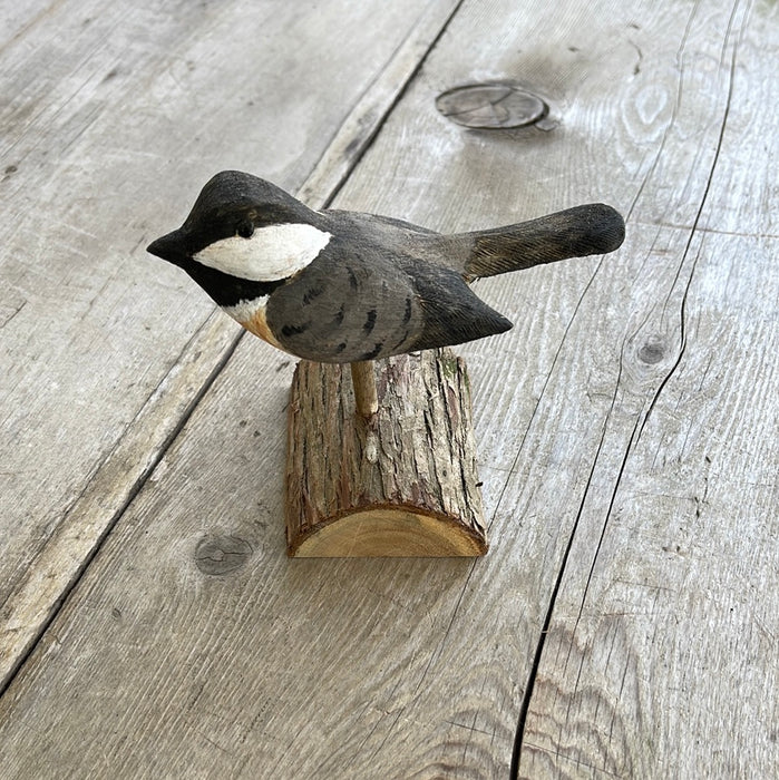 Chickadee on a Log by Tom Harrison