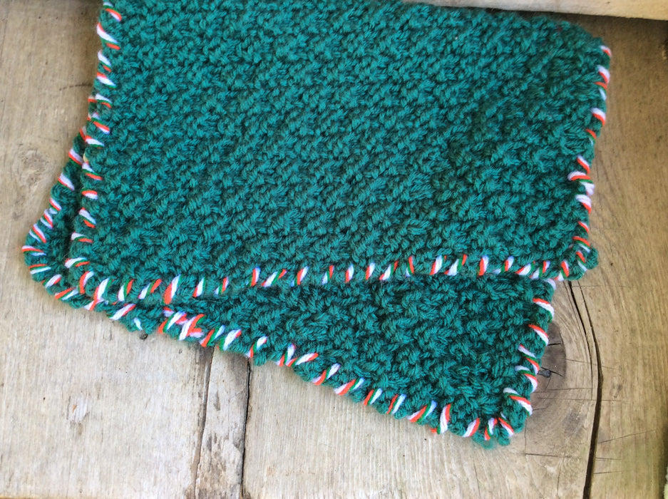 Green Washcloth With Red and White Border